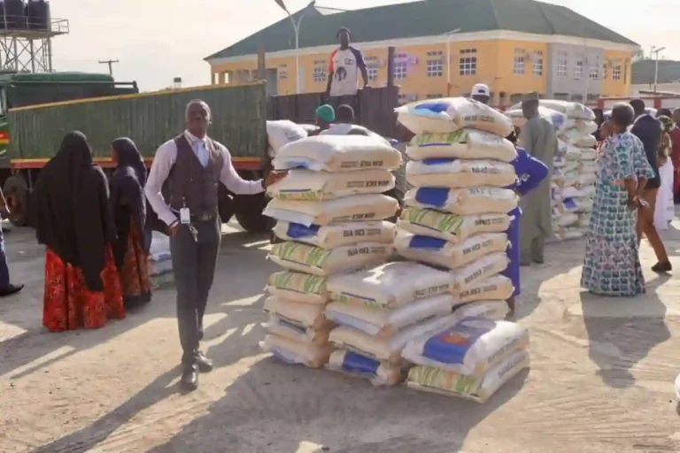 ITF DG distributes bags of rice to staff ahead of Christmas